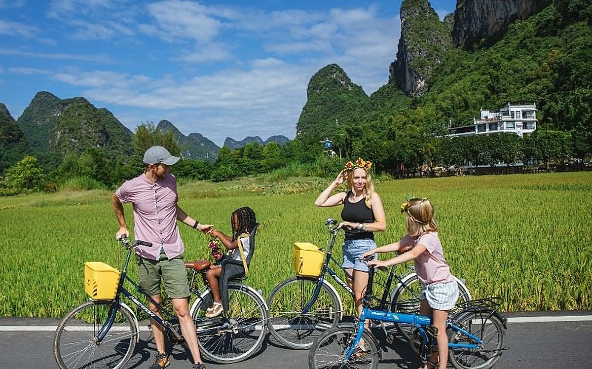 A family with bicycles in Yangshuo