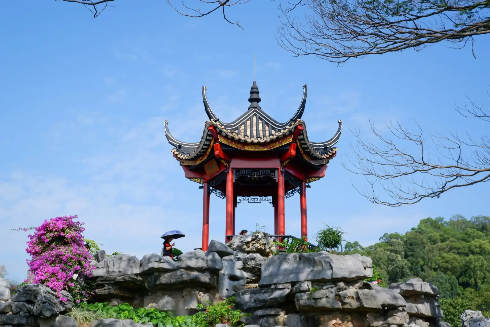 A pavilion among flowering trees at Shunfengshan Park