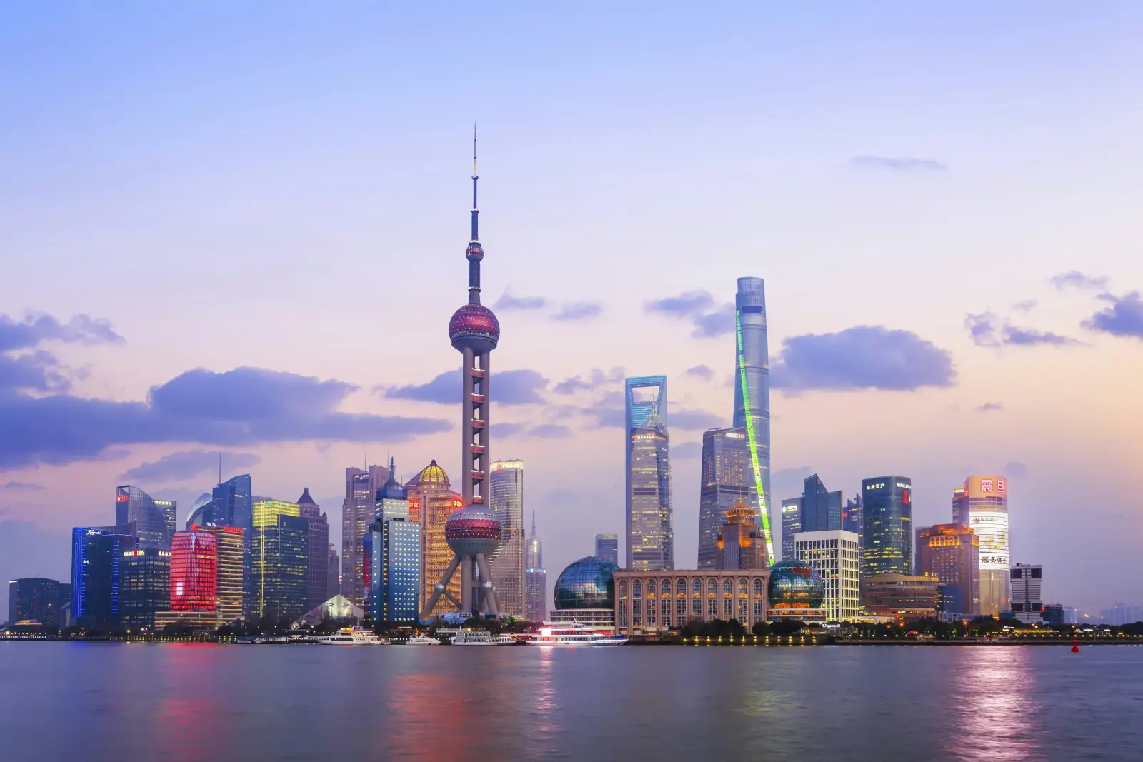 The Shanghai skyline seen from the Bund at dusk
