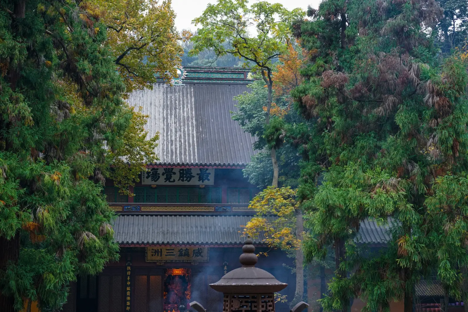 Temple architecture framed by the trees of Lingyin