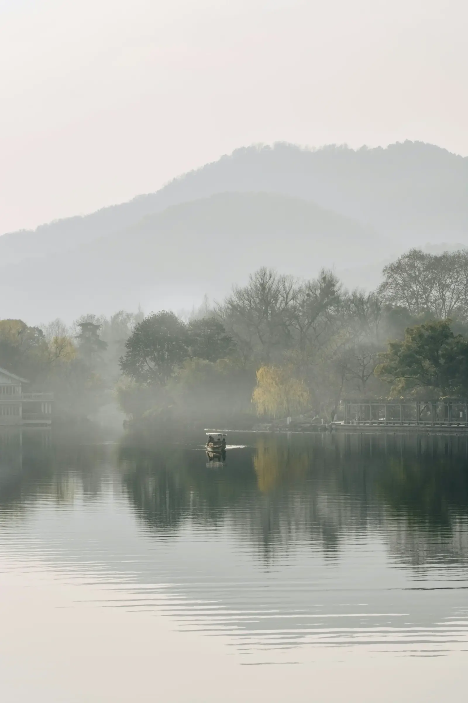 Soft morning light and mist on West Lake