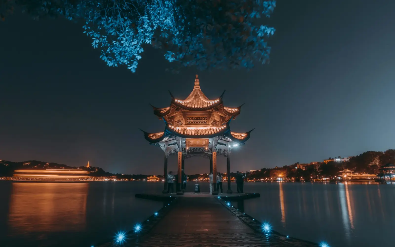 Jixian Pavilion reflected in West Lake at night
