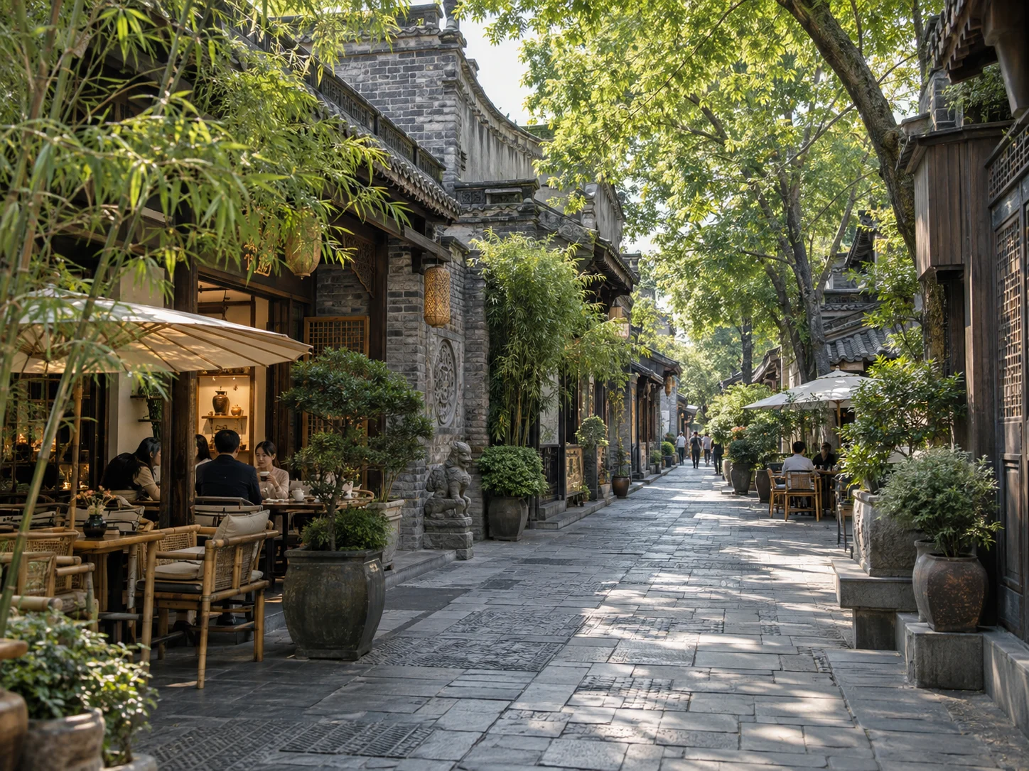 A traditional lane of grey-brick houses with lanterns and open-air tea seats