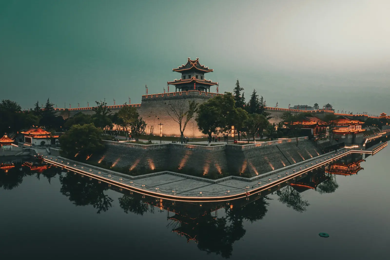 Xi’an city wall and moat reflections at dusk