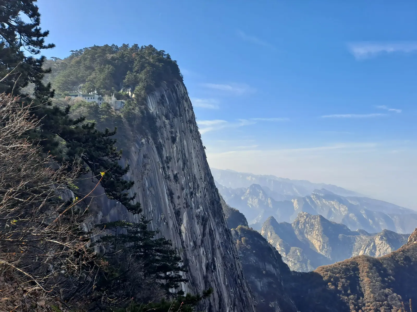 Dramatic granite cliffs and forested valleys of Mount Hua