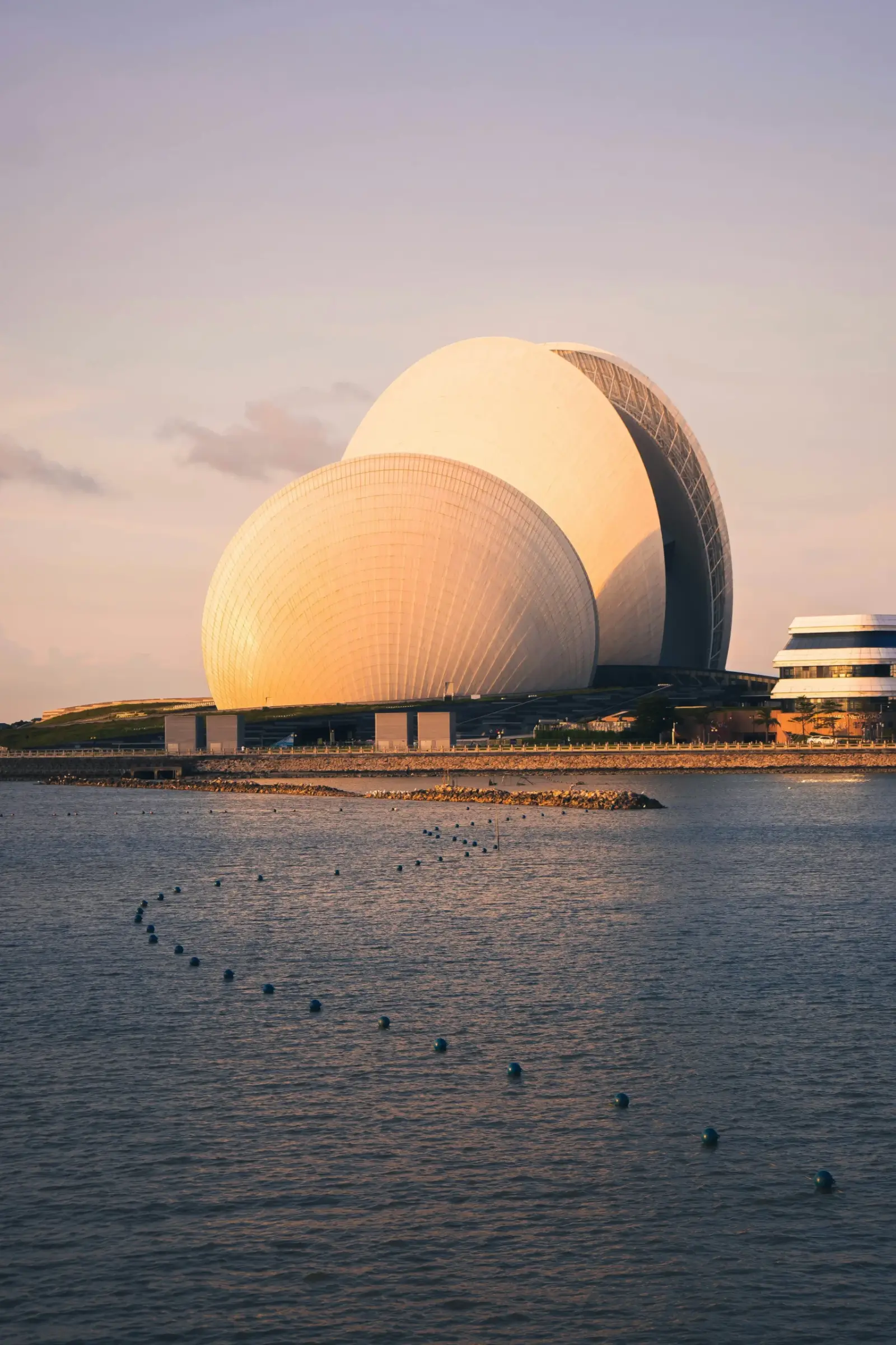 Golden light on the shells of Zhuhai Opera House